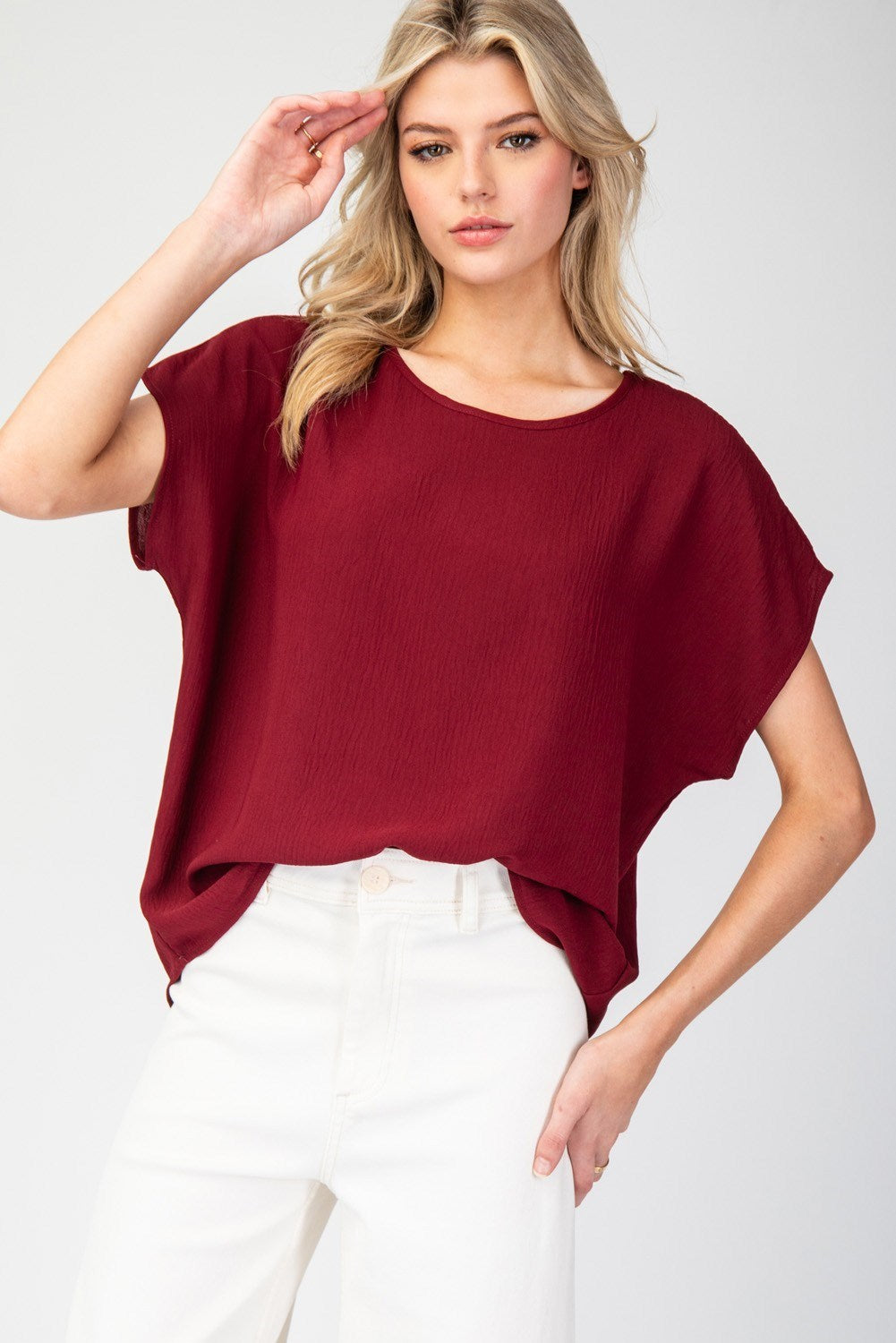 Jiselle Dolman Back Pleat Blouse- Merlot